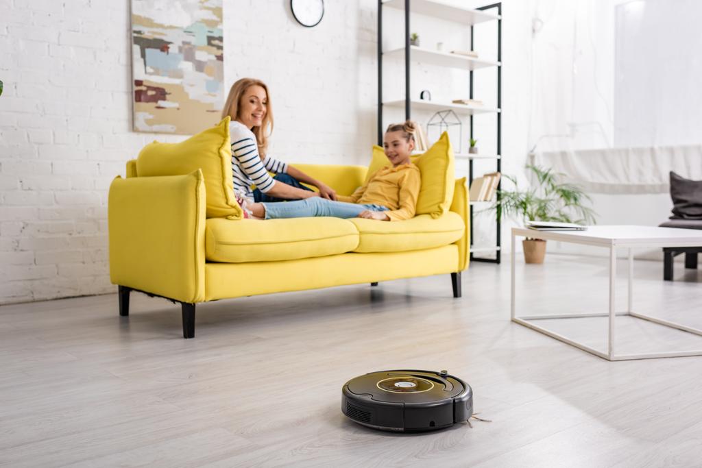 robotic vacuum cleaner on floor in living room
